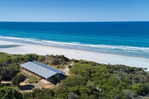 Douglas River House | Seaside Retreat: Timeless Escape with Ocean Views