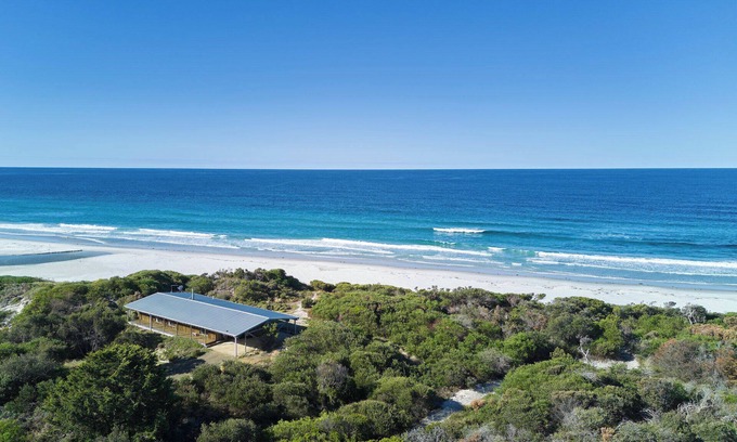 Douglas River House | Seaside Retreat: Rustic Charm with Oceanfront Amenities