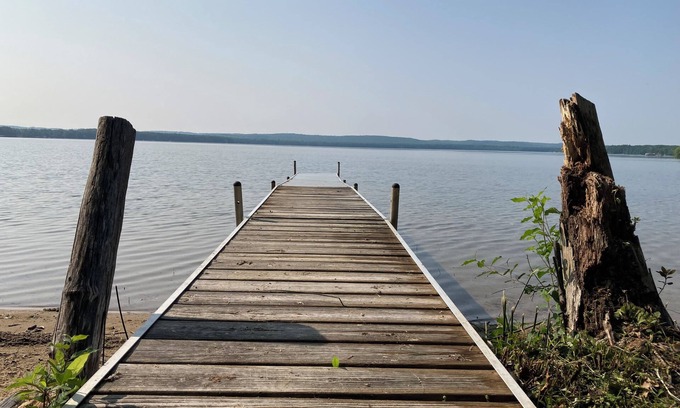 Interlochen Cabin | Idyllic Green Lake Cabin with Oceanfront Views & Spa