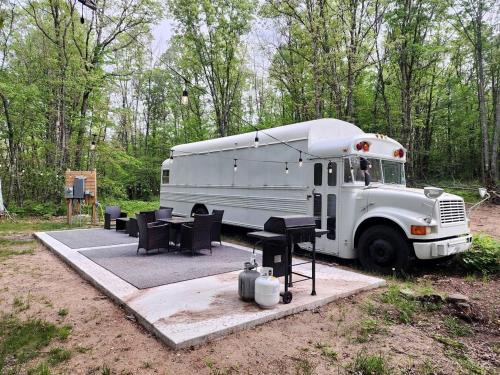 Bitely House | Rustic Converted School Bus with Outdoor Shower Near ORV Trails in Manistee National Forest, Michigan