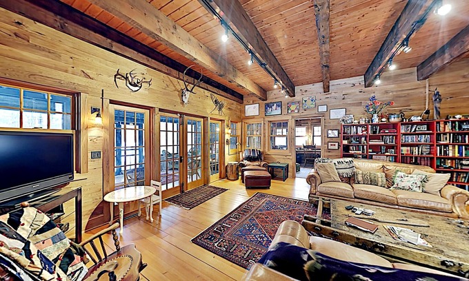 Stone Lake Cabin | Rustic Retreat: Cozy Cabin with Screen Porch by Lake