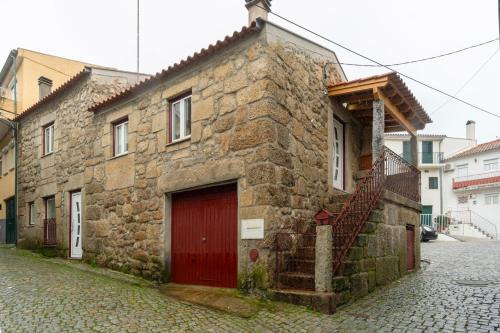 Gouveia House | Inviting Rustic Getaway in Guarda with Family-Friendly Amenities