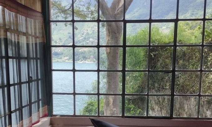 San Antonio Palopo Villa | Rustic lakeside villa with private beach and dock