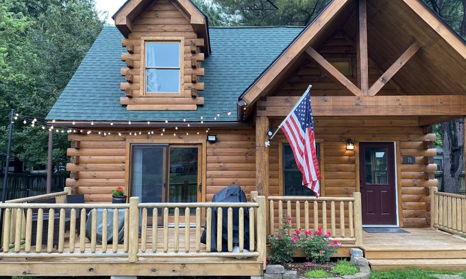 Swinging Bridge Village House | Idyllic Log Cabin at Swinging Bridge: Pet-Friendly Retreat