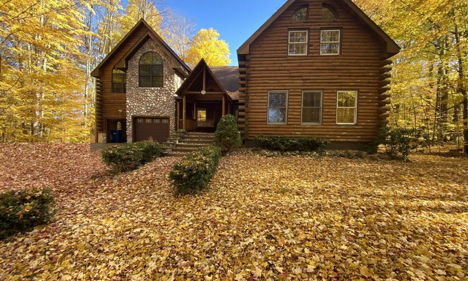 Lake Leelanau House | Idyllic Log Cabin Retreat with Lake Views and Spa Access