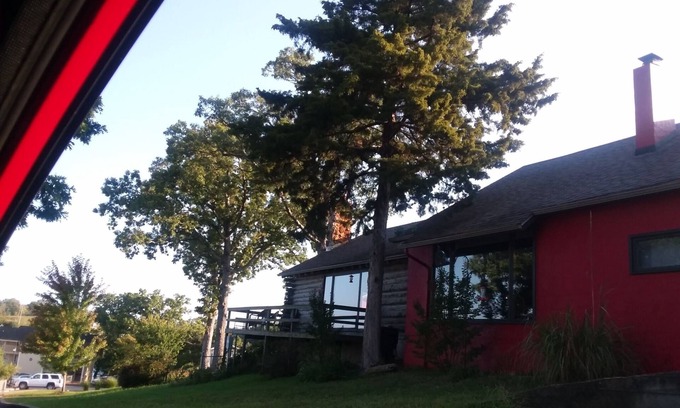 Osage Beach House | Cozy Log Cabin with Ocean Views and Pet-Friendly Amenities