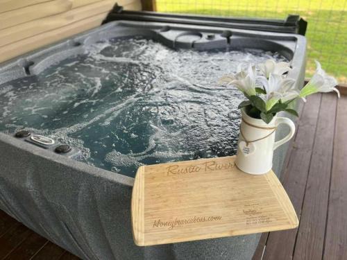 Sevierville House | Family-Friendly Rustic River Lodge by HoneyBearCabins