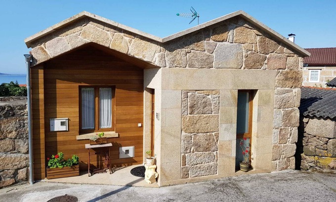 Carnota House | Rustic Stone House with Oceanfront Pool and Spa Bliss