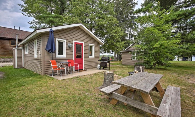 Suttons Bay House | Cozy Suttons Bay Cottage with Shared Dock & Fire Pit