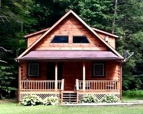 Valley Head House | Rustic Wooden Cabin Settled Between Trees in Monterville, West Virginia
