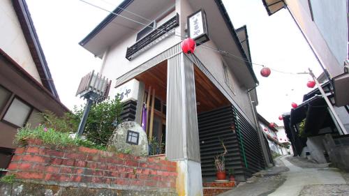 Yufu Hotel | Experience Relaxation at Ryokan Maruya with Hot Tub Amenities