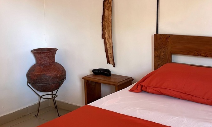 Ziguinchor Bed & Breakfast | Inviting Sérénité Double Room with Family-Friendly Amenities
