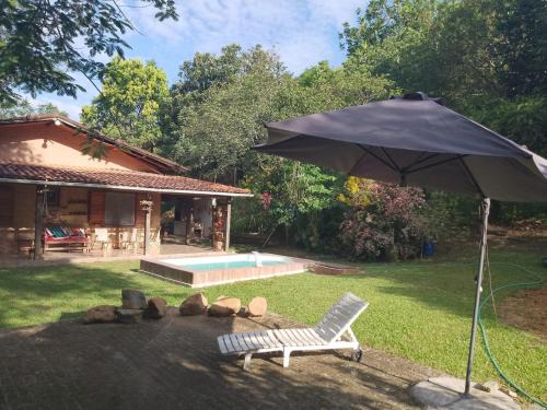 Silva Jardim House | Idyllic Retreat at Sítio Completo with River Views