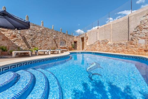 Santanyi House | Relax at S'era: 4-Star Hotel with Pool & Child-Friendly Options