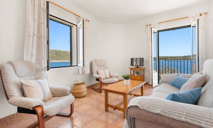 Fornells Apartment | Experience Sa Mirada: Oceanfront Living with Spa Amenities