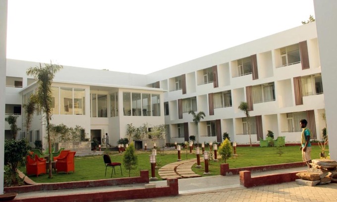Courtallam Hotel | Discover Comfort at Saaral Resorts & Hotels with Pool & Spa