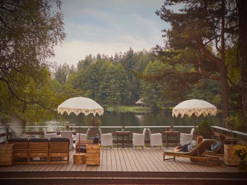 Polva County House | Experience Saarjärve Puhkemaja: 8-Bedroom Retreat by the Sea
