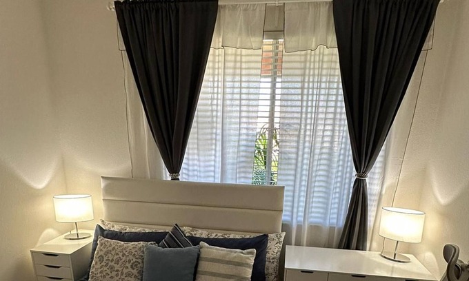 Airport Area Apartment | Tranquil & Comfortable Hotel with Pool and Family Amenities