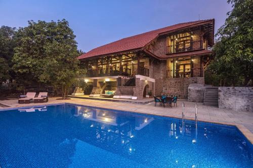 Suryamal Villa | Eco-Friendly Riverfront Villa with Pool | SaffronStays Vedika