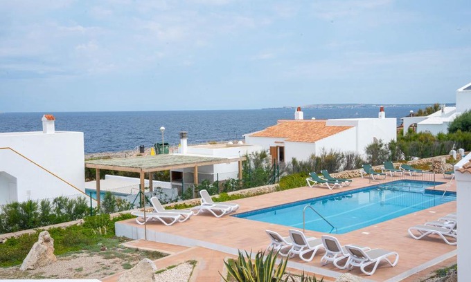 Cap d'Artrutx Apartment | Discover Villas Rymar: Family-Friendly with Pool & Breakfast