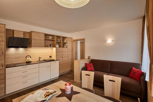 Colfosco Apartment | Experience Saina: Top-Rated Stay with Guest Score 9.1