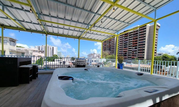 Sagrado Corazon House | Discover Saldana Townhouse with Rooftop Pool & Spa