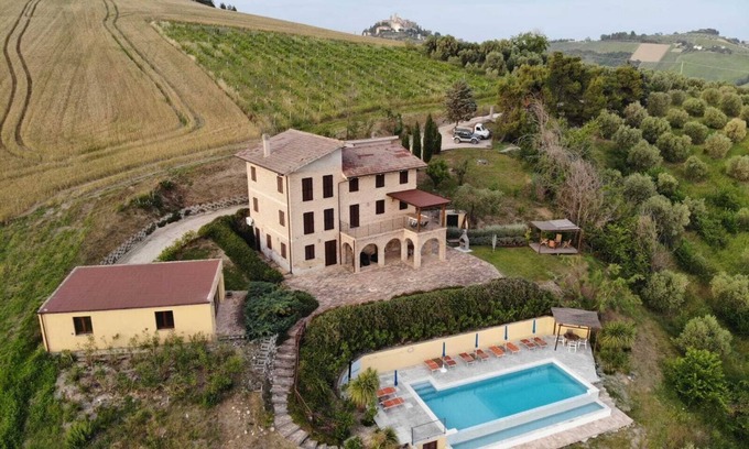 Cossignano Villa | Elegantly Designed Villa with Infinity Pool & Ocean Views