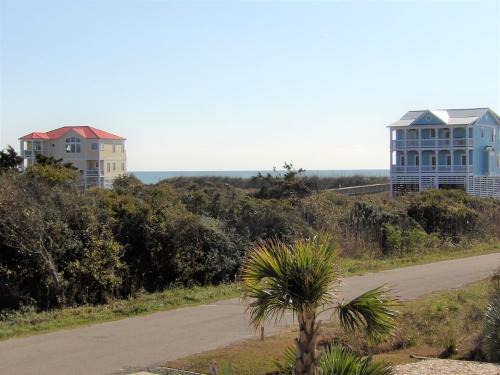 Yaupon Beach House | Relax at Sally's Sandcastle: Pool & Family-Friendly Stay
