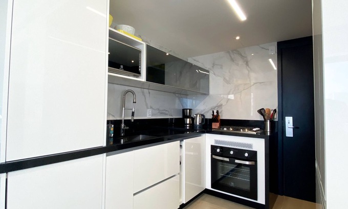Jardim Paulista Apartment | Discover Sampa House - Modern Design Studio with Pool & Spa
