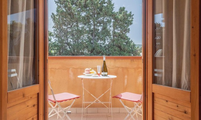 Campofelice di Roccella Apartment | Relax at San Carlo: Private Beach with Ocean View & Family Fun
