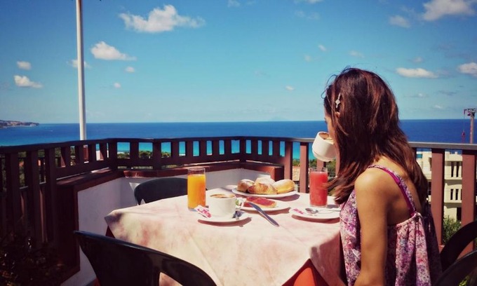 Marina di Zambrone Bed & Breakfast | Experience San Carlo: Oceanfront Dining & Pet-Friendly Stays