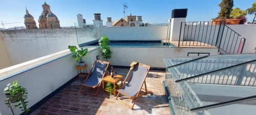 San Julian Apartment | Ideal San Luis Downtown & Pool Apartment with Ocean Views