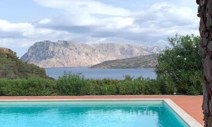 Capo Coda Cavallo Apartment | Ocean View Retreat: San Teodoro Punta Est Triloocale