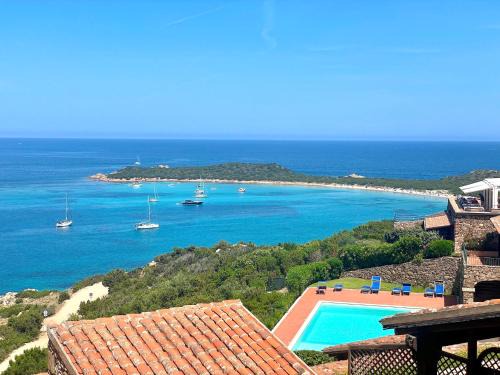 Capo Coda Cavallo Apartment | Experience Beachfront Bliss at San Teodoro PUNTA EST