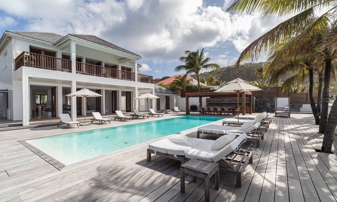 Anse des Flamands Villa | Relax at the Sand Club: Oceanfront Bliss and Great Amenities