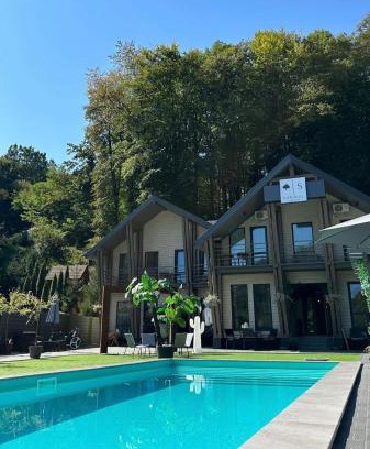 Shaian House | Relax at Sandal: Oceanfront Bliss with Spa & Pool Access