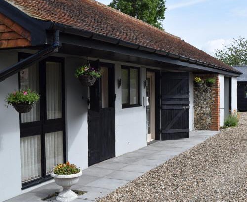 Sittingbourne House | Top-Rated Sandhurst Farm Forge Self Catering Stableblock