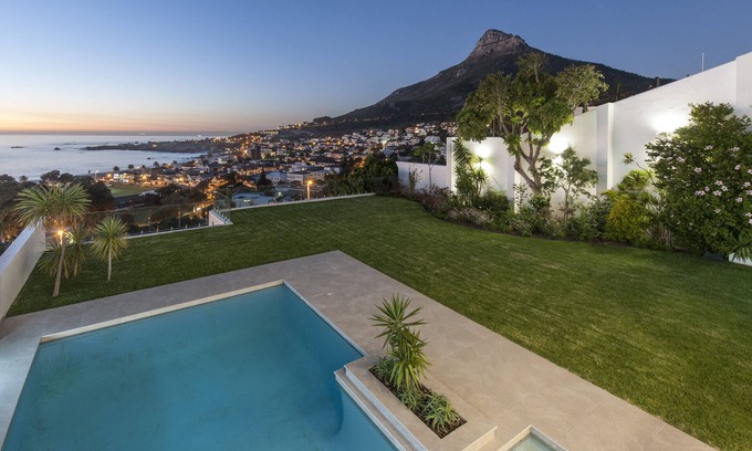 Camps Bay Villa | Sandpiper House: Oceanfront Paradise with Pool & Garden