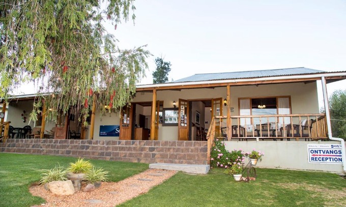 Barrydale House | Discover Sandy's Place: Family-Friendly with Pool Access
