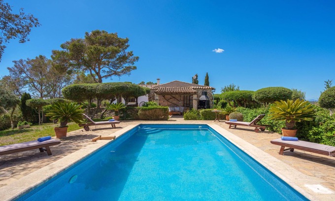 Sant Joan House | Oceanfront Escape: Sant Joan by Interhome with Pool & Spa