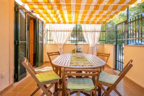 Can Picafort Apartment | Experience Santa Eulalia: Pet-Friendly & Family-Oriented Stay