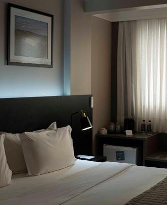 Barra Sul Hotel | Discover Comfort at Santa Inn Hotel with Pool & Breakfast