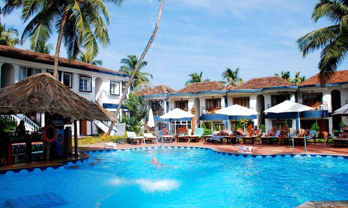 Sinquerim Resort | Idyllic Santana Beach Resort: Oceanfront Oasis with Pool