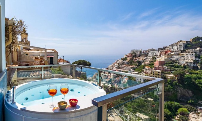 Liparlati Apartment | Relax in the Santoro Suite with Hot Tub & Family Amenities