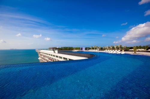 Tianya District Hotel | Relax at Sanya Conifer Resort: Oceanfront Paradise Awaits