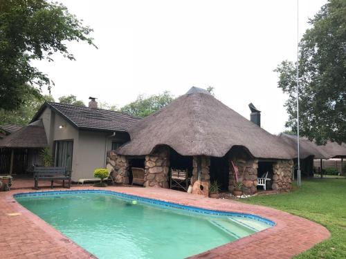 Kathu House | Inviting Sanyati Guesthouse with Pool & Pet-Friendly Options
