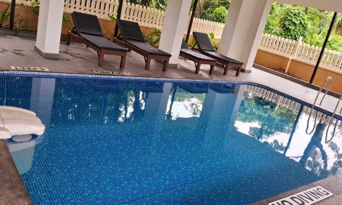 Betalbatim Apartment | Relax at Sapana Meadows: Pool, Breakfast & Family Fun