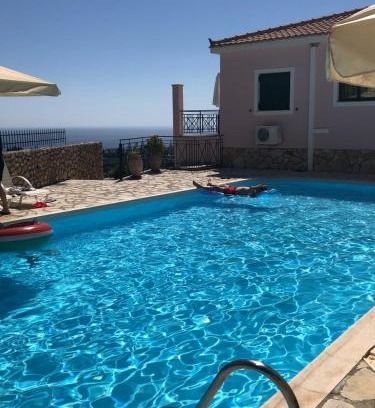 Sarlata Apartment | Experience Tranquility at Sarantos Pool Suites with Ocean View