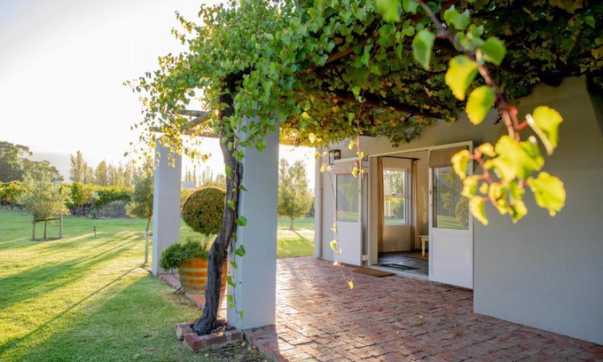 Tulbagh House | Scenic Saronsberg Vineyard Cottages with Pool & Ocean Views