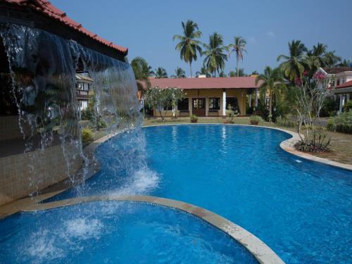 Majorda Apartment | Inviting Saudades Homestays: Poolside Retreat for Families